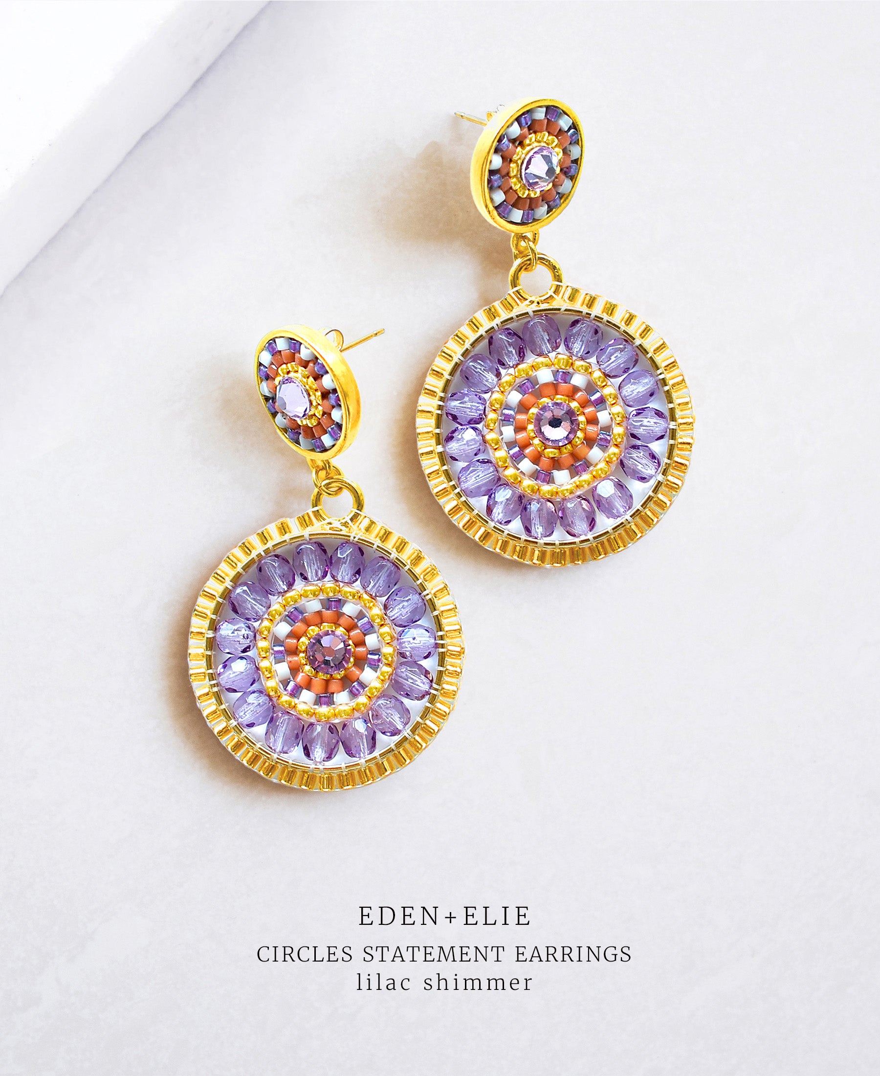 EDEN + ELIE double circle statement drop earrings - lilac shimmer