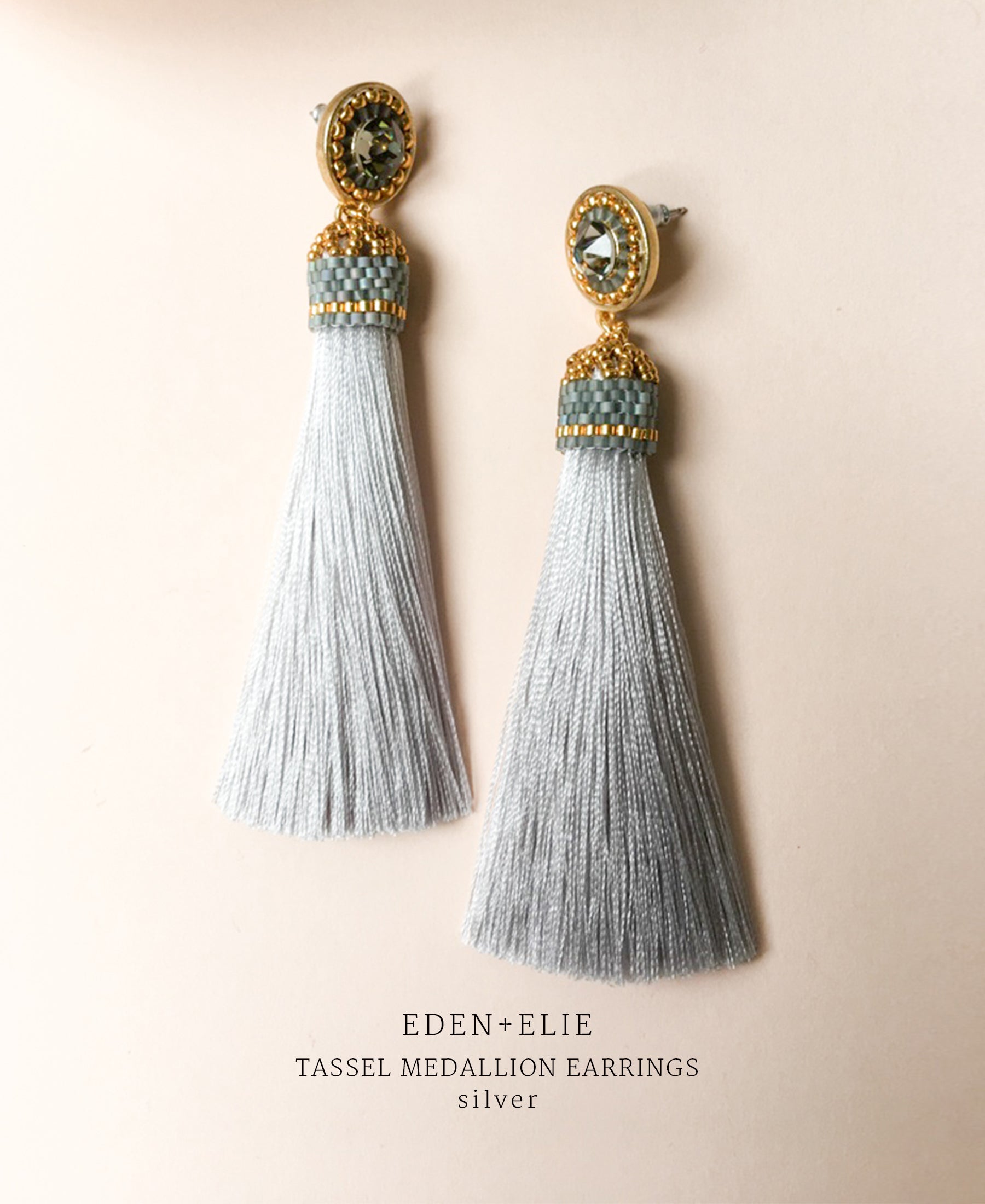 EDEN + ELIE silk tassel statement earrings - silver